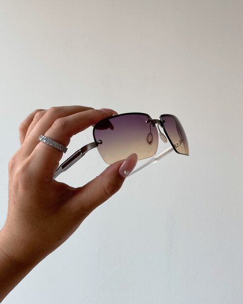 PRADA RIMLESS TINTED SUNGLASSES